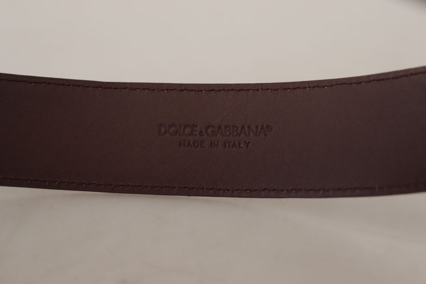 Dolce & Gabbana Elegant Maroon Leather Belt with Engraved Buckle